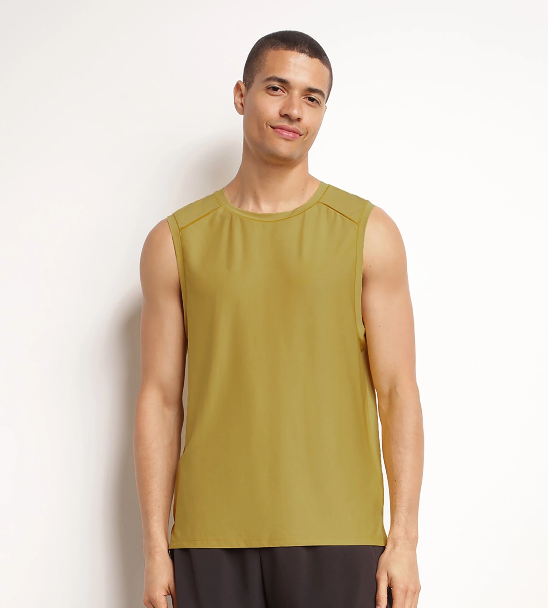 Débardeur de sport homme en matière aérée Olive Dim Move