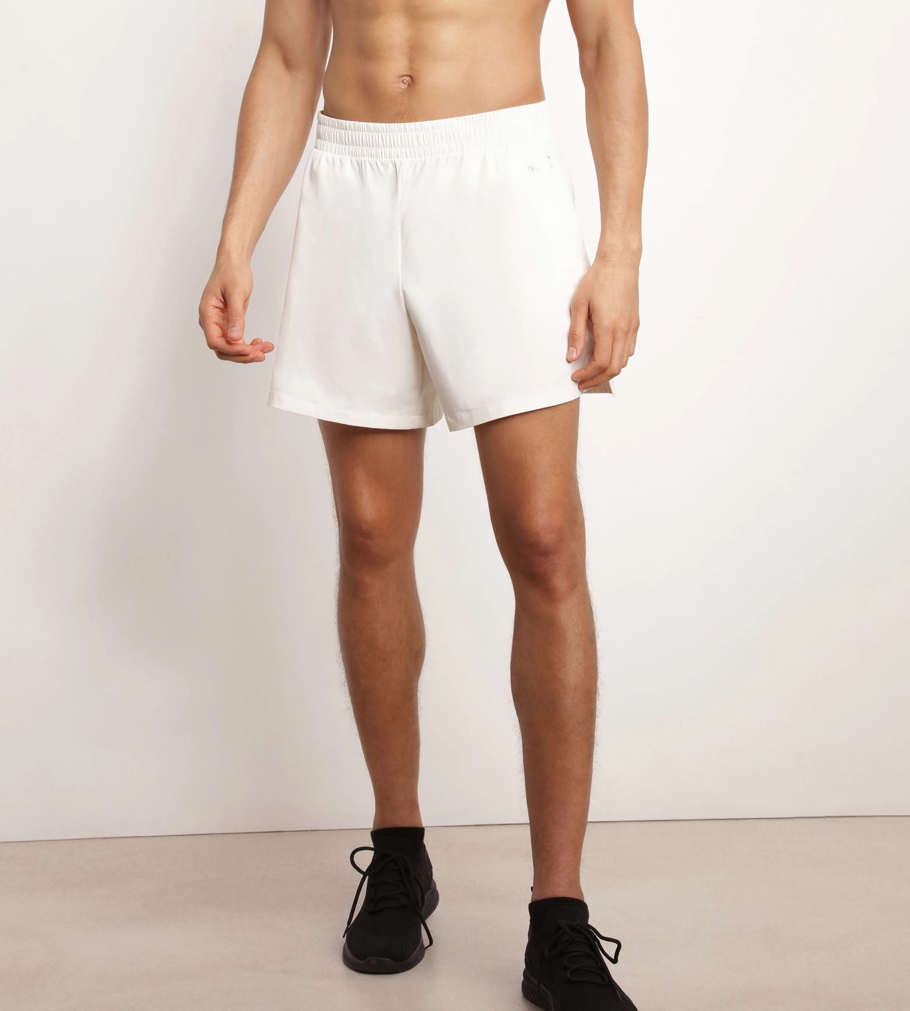 Short de sport homme en matière aérée Écru Dim Move